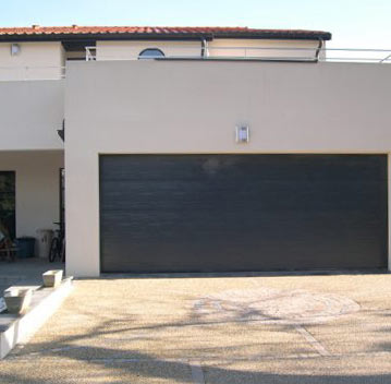 Porte de garage : Porte de garage sectionnelle motorisée